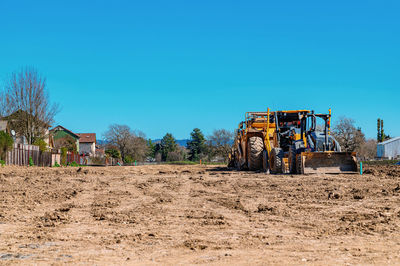 Construction site. road construction machinery on highway construction. blue sky background