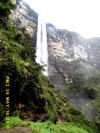 Low angle view of waterfall