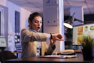 Portrait of businesswoman working in office