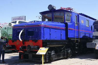 Train on railroad track against sky