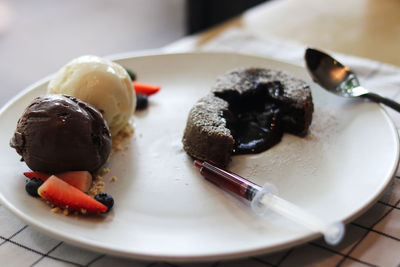 Close-up of dessert in plate on table