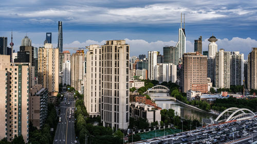 Skyscrapers in city against sky