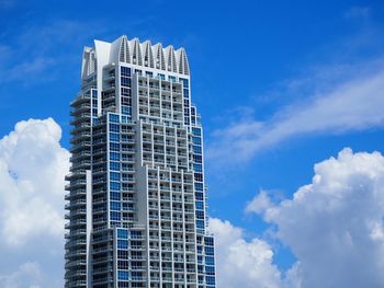 Low angle view of modern building against sky