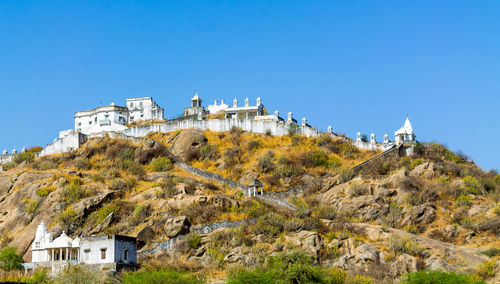 Traditional building against clear blue sky