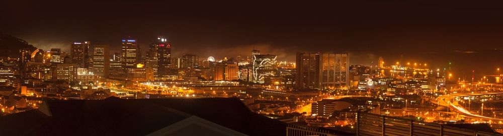 Illuminated cityscape at night