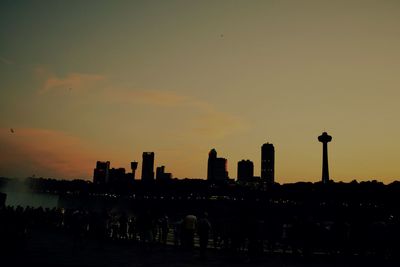 Silhouette of buildings at dusk