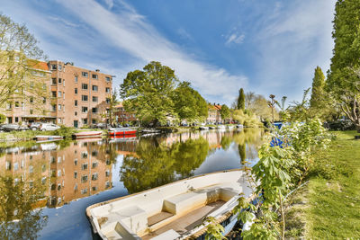 High angle view of boats in lake against sky