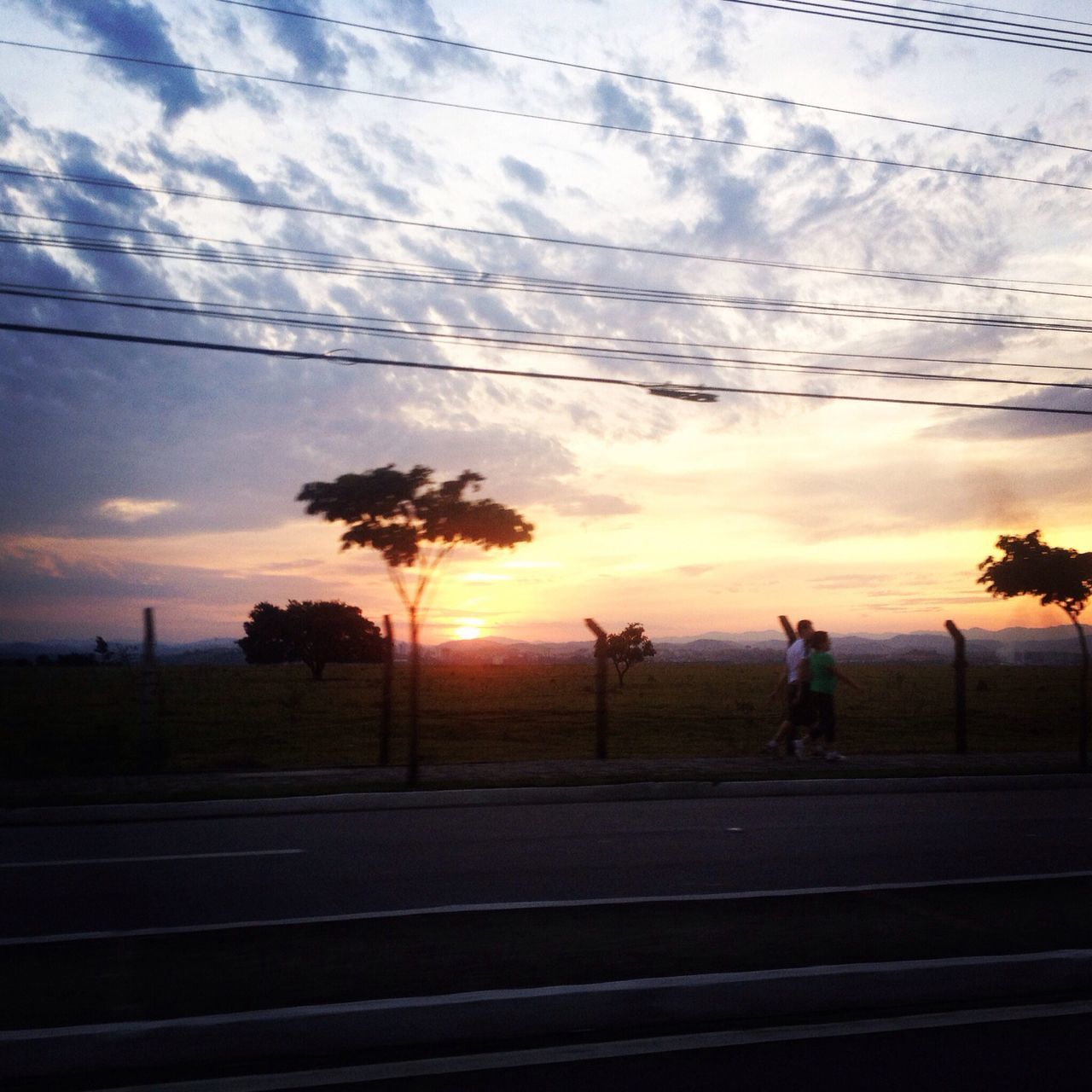 sky, cloud - sky, sunset, transportation, road, silhouette, tree, cloud, cloudy, lifestyles, the way forward, men, landscape, scenics, nature, tranquil scene, leisure activity, tranquility