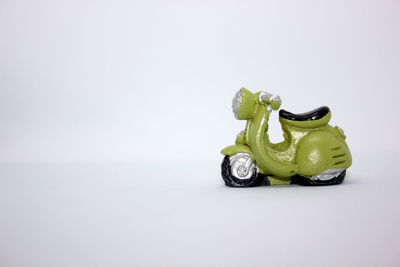 Close-up of toy car against white background