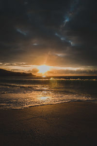 Scenic view of sea against sky during sunset