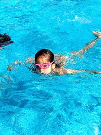 Girl swimming in pool