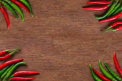 Directly above shot of chili peppers on table