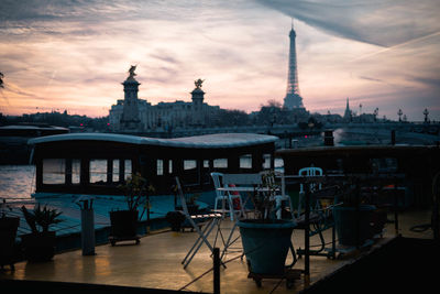 View of buildings in city at sunset