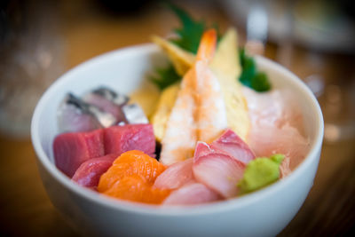 Close-up of fruits in bowl on table