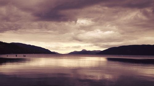 Scenic view of sea against cloudy sky