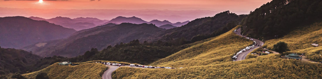 Panoramic view of landscape against sky during sunset