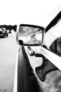 Close-up of car on side-view mirror