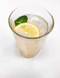 Close-up of drink against white background