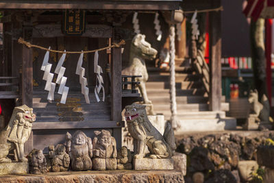 Statue against temple outside building