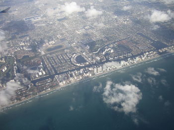 Aerial view of cityscape against sky