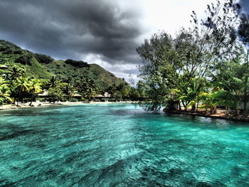 Scenic view of sea against cloudy sky