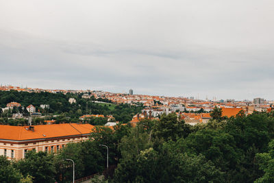 Aerial view of townscape against sky