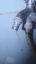 Close-up of water falling from faucet