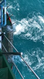 High angle view of ship sailing in sea