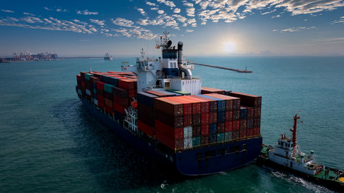 Aerial view container cargo ship carrying commercial container in import export business 