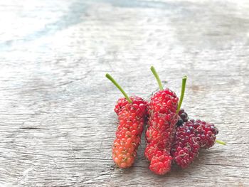 High angle view of strawberries on table