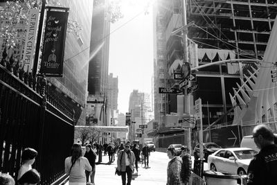 People walking on street in city