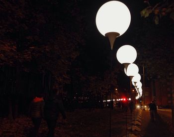 Illuminated street light at night