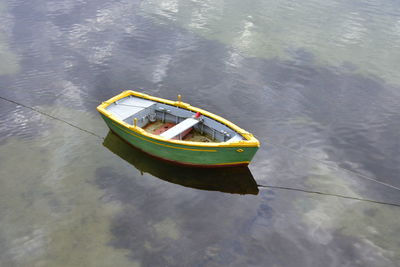 High angle view of boat moored in lake