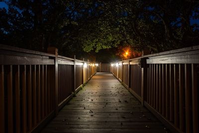 View of footbridge at night