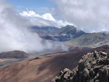 Scenic view of volcanic landscape against sky