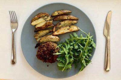 High angle view of vegetables in plate on table