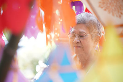 Close-up portrait of woman wearing mask