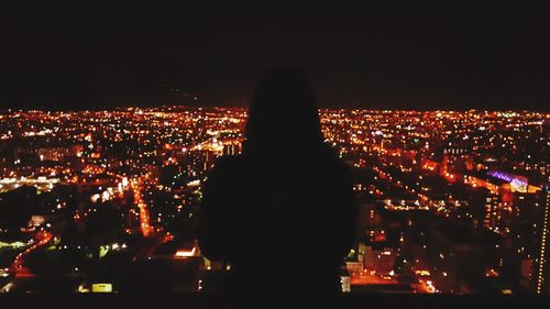 Illuminated cityscape at night