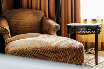 Empty chair on table at home