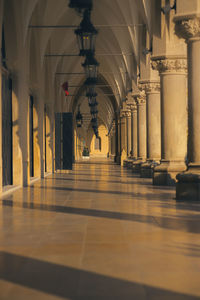 Empty corridor of building in krakow market square