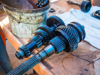 Close-up of oily gears at mechanic