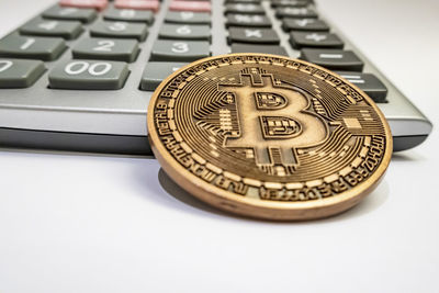 High angle view of coins on table