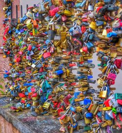 Close-up of padlocks hanging on metal