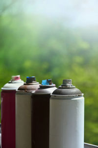 Close-up of spray cans