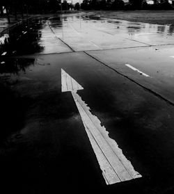 Reflection of road in puddle