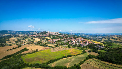 Aerial view of townscape against sky