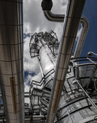 Low angle view of factory against sky