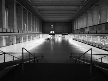 Person walking in illuminated building