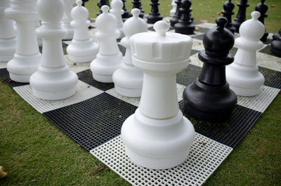 High angle view of chess pieces at park