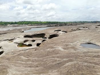 Scenic view of land against sky